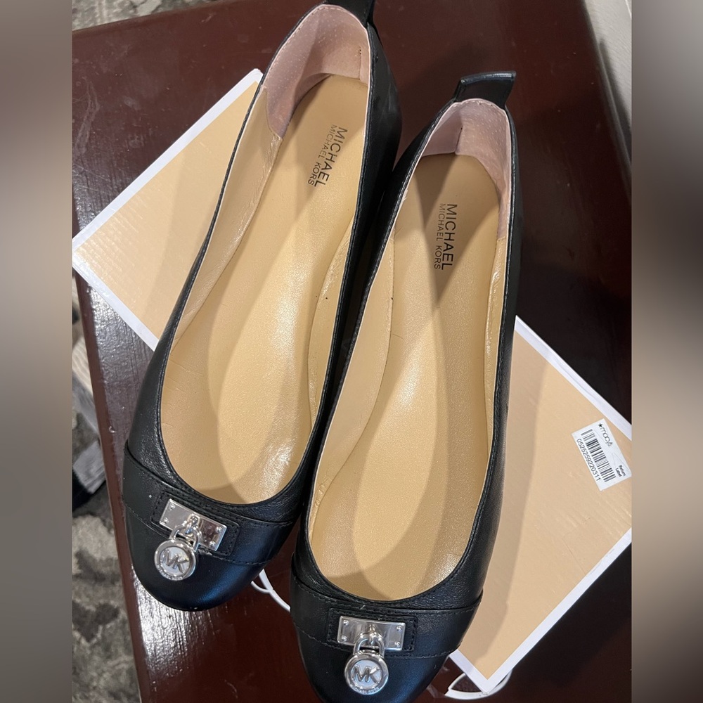 Michael Kors black flats with metal detail